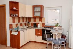 Apartments with a parking space Novalja, Pag - 22146