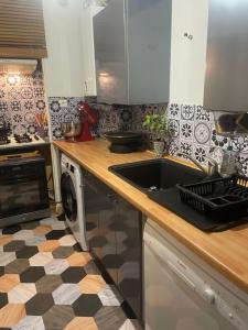 Appartements Tout confort : photos des chambres