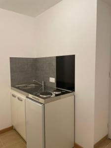 Sejours chez l'habitant Cosy studio, lit double : photos des chambres