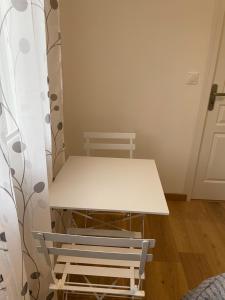 Sejours chez l'habitant Cosy studio, lit double : photos des chambres