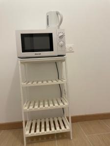 Sejours chez l'habitant Cosy studio, lit double : photos des chambres