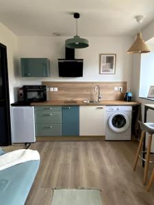 Entre ville et campagne appartement cosy avec parking et terrasse Wood