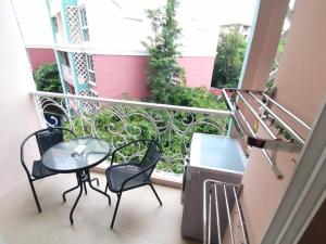 Grande Caribbean Condo by Somphong