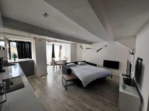 Appartements Charmante maison Climatise avec Netflix et Disney plus : photos des chambres