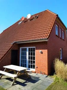 Ferienhaus Kolibri, exklusiv und familiär in Neßmersiel mit Anbindung nach Baltrum - Несмерсіль