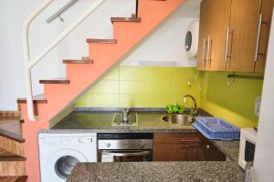 Delightful Bungalow Playmar: Comfort and Convenience in Maspalomas, Steps Away from Shopping Centers and Beaches