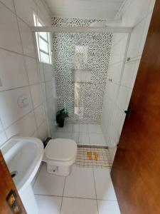 Casa Espaço Sara Piscina Aquecimento Solar total privacidade, área gourmet completa com churrasqueira fogão a lenha, a 5min do centro e do parque das águas