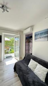 Appartements Charmant T1 entre ville et lac avec balcon : photos des chambres