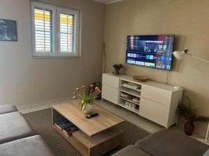 Red House Apartment With Swimming Pool