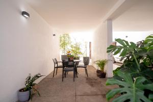 Luz, plantas y dos camas por recámara, Americana