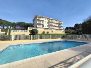 Elegant Two-Bedroom Apartment with Private Pool and Parking