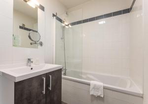 Cosy plage - Apt entièrement climatisé avec piscine partagée et garage clos