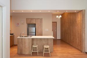 Contemporary apartment made of wood and stone.