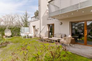 EXIGEHOME-Comme une maison avec jardin et parking privé