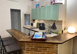 Appartements Logement Atypique : photos des chambres