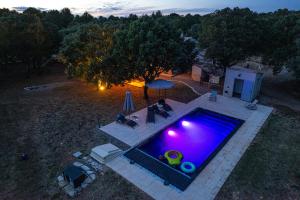 Maisons de vacances Coeur de Lavande - Maison climatisee avec piscine : photos des chambres