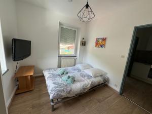 Appartements Au petit Meuh-ster : photos des chambres