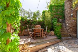 Appartements Logement de charme les Araucarias : photos des chambres