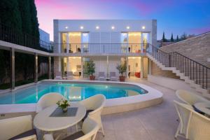 Luxury Beachfront Villa Castello Bol with private pool at the promenade Zlatni Rat at the beach in Bol - Brac