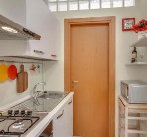 L’orchidea rooms, cucina e bagno in comune