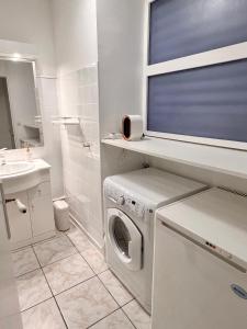 Appartements The Sunrise ~ Spacious, fully equipped & parking : photos des chambres