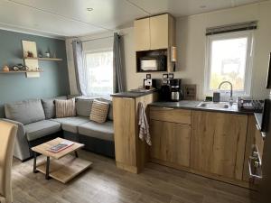 Campings Domaine de Kerlann - Mobilhome refait a neuf- 40m2 - service de conciergerie et lits faits OFFERTS : photos des chambres