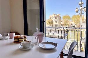 Appartements Les Palmiers - Les Pecheurs de Perle : photos des chambres