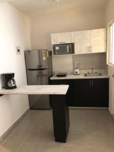 Apartamento familiar con alberca en Playa del Carmen