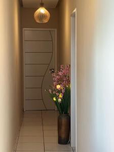 Quarto em AP compartilhado Ponta da areia