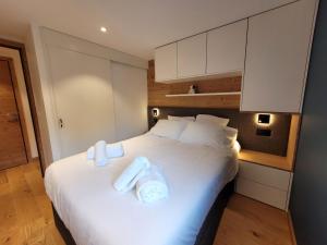 Appartement lumineux 3* avec terrasse, 2 chambres, proche centre et pistes, garage inclus - FR-1-598-163