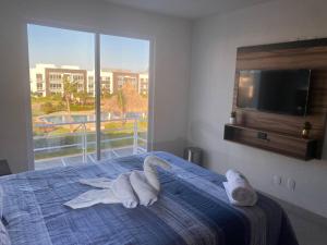 Increíble departamento Club de Playa canchas de pádel para 8 huéspedes