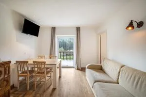 Silbernagl sonnig mit Gartenblick - Issengo