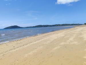 7 COCOTIERS F2 terrasse jardin plage privée avec vue mer