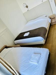 Appartements Le Leonard- T5 entre Loire et Chateau Royal - Manoir de la Concorde : photos des chambres