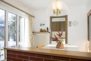 Ferienwohnung Mistaila mit Garten für 6 Personen Lenzerheide