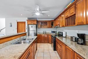 Inviting Home with Colorful Decor and Private Backyard Oasis with a Swimming Pool & Shaded Terrace