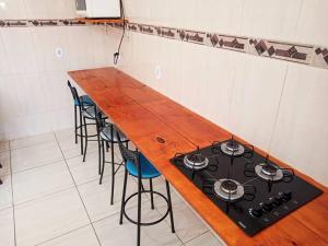 Casa com churrasqueira e piscina