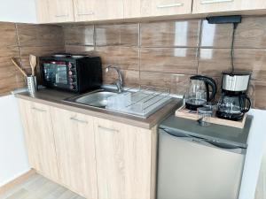 Nouri schöne Wohnung in direkter Strandnähe, schnelles Internet, freies Parken, nahe Flughafen