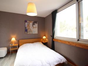 Appartements T3 duplex avec parking privatif a 100m du centre, proche thermes, wifi, equipe, max 5 pers, La Bourboule - FR-1-608-269 : photos des chambres