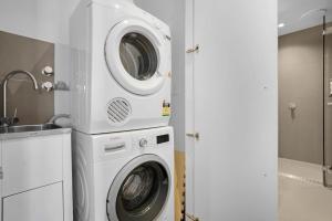 NEW Waterfront Living With Sublime Views 2B1B