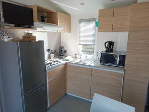 BJ Chalets - Robbengat 85 - Gezellige chalet op vakantiepark Lauwersoog! Vroege incheck! MET AIRCO!