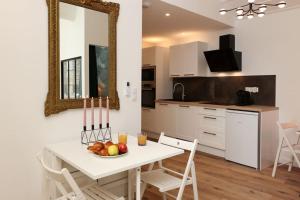 Appartements La Demeure du Chevalier d'Argent- parking gratuit : photos des chambres