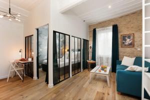 Appartements La Demeure du Chevalier d'Argent- parking gratuit : photos des chambres