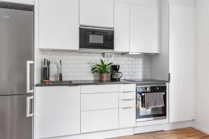 Modern Stylish Apartment With Balcony In Stockholm