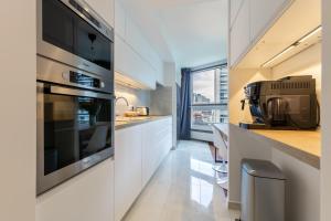 Comfortion Zaira - Suite de luxe avec vue sur la Défense