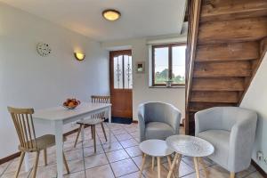 Maisons de vacances La petite maison bleue : photos des chambres
