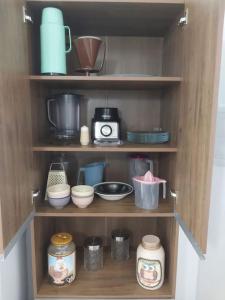 Apartamento novo região central de Ubatuba, com churrasqueira e varanda, 2 vagas - Residencial Jathy