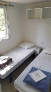 Campings Mobil home 4/6 personnes Camping les dunes - les Conches : photos des chambres