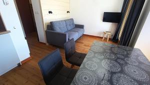 Appartements Residence Alpages Bellevue - Studio pour 4 Personnes 241 : photos des chambres