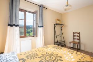 Pepoule - Appartements avec vue sur les monts du Beaujolais : photos des chambres